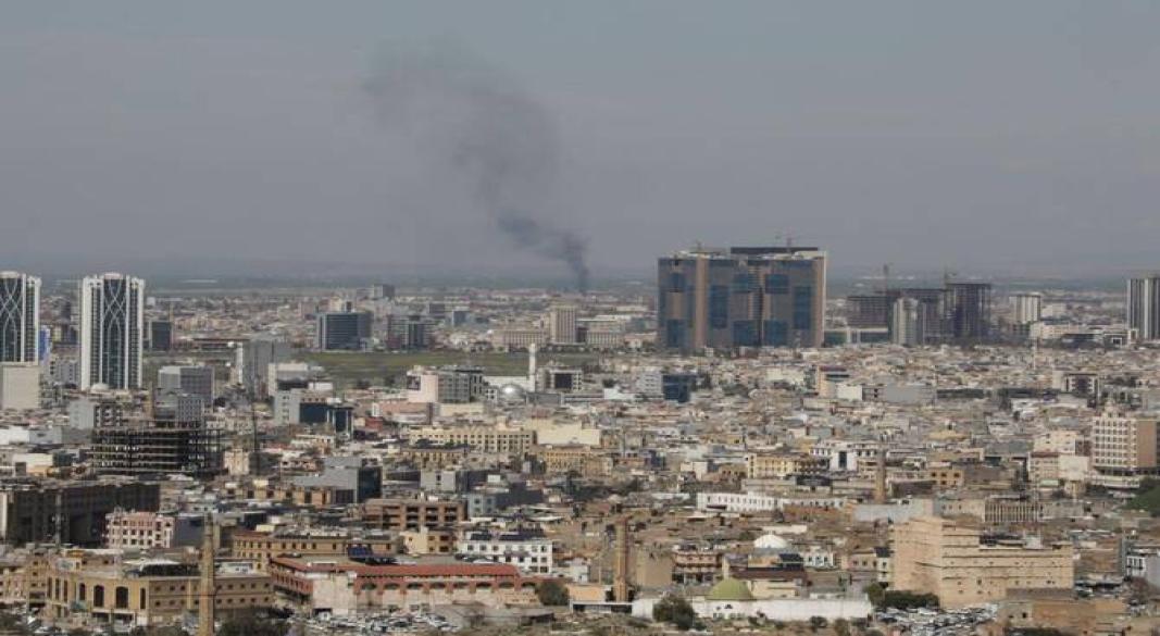 A plume of smoke rises following an interception of a drone in Erbil